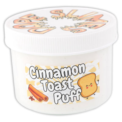 Indulge in a playful twist on a a favorite cereal with our Cinnamon Toast Puff! This white ultra soft butter slime is filled with brown glitters and scented like a sweet cinnamon sugar cereal. Topped with toast fimos and a cinnamon roll charm, it's a delicious sensory experience!